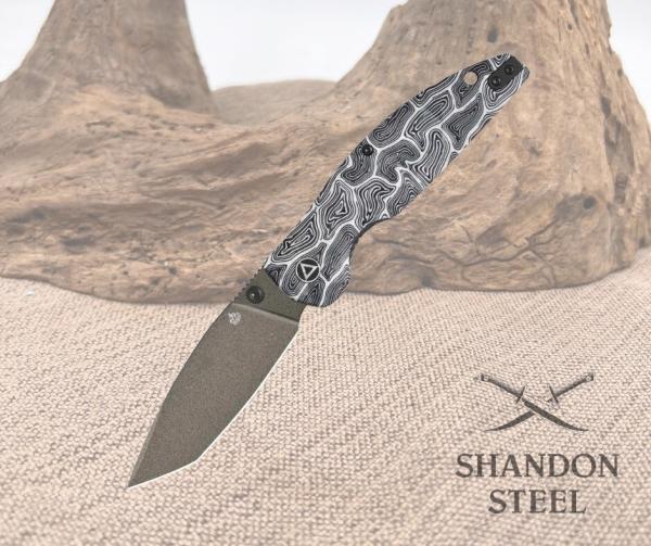 QSP Turtle Punk Pocket Knife 14C28N Blade Black/White G10 Handle QS158-B2 QSP Turtle Punk Pocket Knife 14C28N Blade Black/White G10 Handle QS158-B2