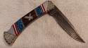 David (Dave) Yellowhorse "Damascus - Custom"  Eagle knife.  In display case. SN 0224