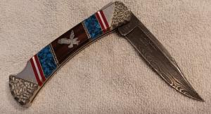 David (Dave) Yellowhorse "Damascus - Custom"  Eagle knife.  In display case. SN 0224
