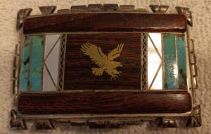 Dave (David) Yellowhorse Sterling Belt buckle with Ironwood, turquoise and mother of pearl inlay.