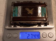 Dave (David) Yellowhorse Sterling Belt buckle with Ironwood, turquoise and mother of pearl inlay.
