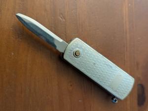 VINTAGE BUTANE CIGARETTE LIGHTER PLUNGLOCK SWITCHBLADE DAGGER BLADE  