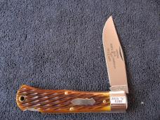 GREAT EASTERN TIDIOUTE 421125LB LOCKBACK MISSOURI TRAPPER ANTIQUE YELLOW JIG BONE #1