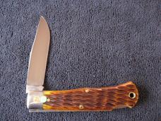 GREAT EASTERN TIDIOUTE 421125LB LOCKBACK MISSOURI TRAPPER ANTIQUE YELLOW JIG BONE #1