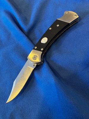 NIB  BUCK 112  Tribute 
