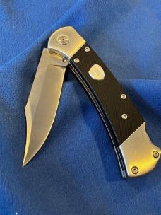 NIB  BUCK 112  Tribute 