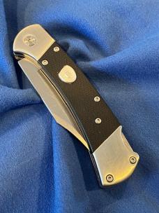 NIB  BUCK 112  Tribute 