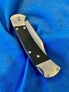 NIB  BUCK 112  Tribute 