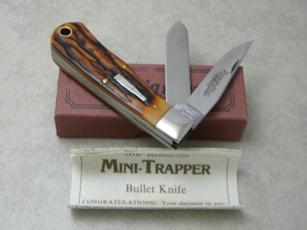 Remington Bullet 1991 R1178 Imitation Stag Mini Trapper Knife in Box Remington Bullet 1991 R1178 Imitation Stag Mini Trapper Knife in Box