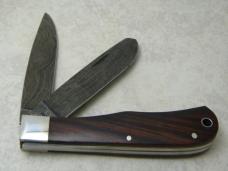 Remington USA R1128 2007 25th Anniv. Cocobola Damascus Silver Bullet Trapper Knife in Tin