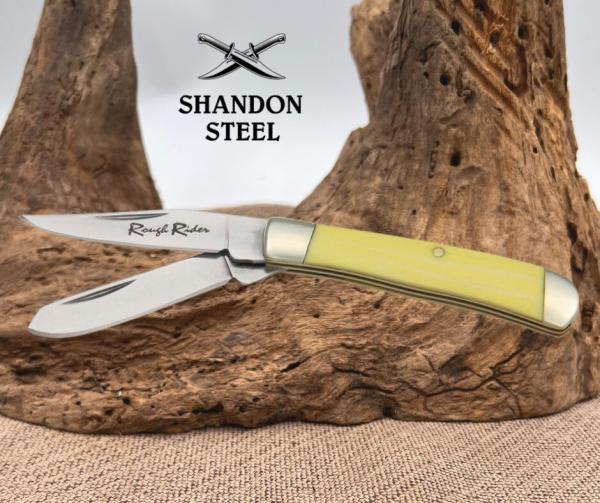 Rough Rider 2" Tiny Trapper Smooth Yellow Synthetic Handles w/lanyard Loop RR804 Rough Rider 2" Tiny Trapper Smooth Yellow Synthetic Handles w/lanyard Loop RR804