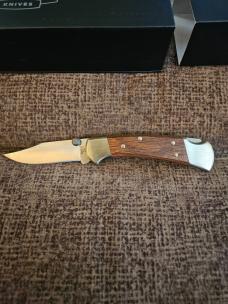 Buck 112 Walnut scales 