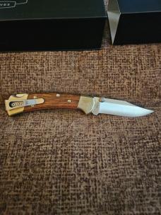 Buck 112 Walnut scales 