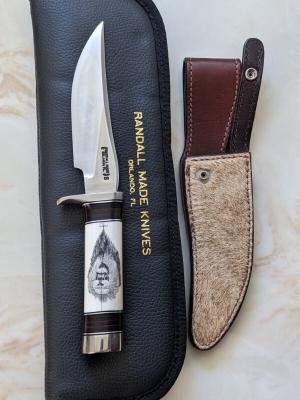 Randall Model 27 Ivory scrimshaw by Hutch Lion