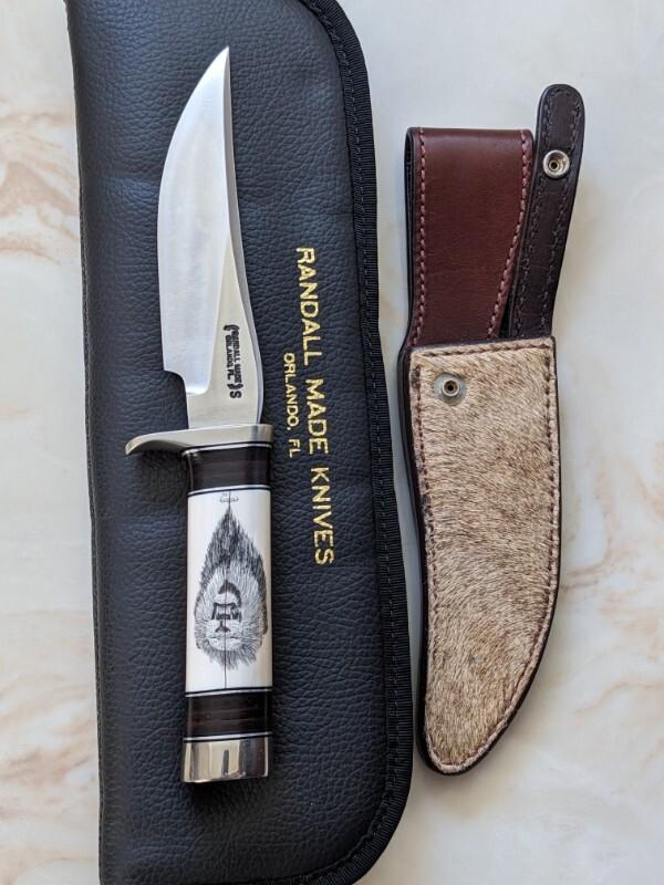 Randall Model 27 Ivory scrimshaw by Hutch, Lion!
