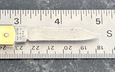 Schrade Advertising Pull Ball Switchblade Knife, Cream Color Scale, Unused