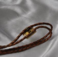 Bola Tie Seal Sitting On Ice Flow Carved From Ivory Leather Cord With Sterling Silver Tips 