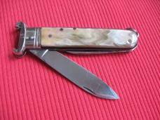 VINTAGE ROSA V. MANIAGO INOX STAMPED ITALIAN MANUAL SHELL PULLER KNIFE