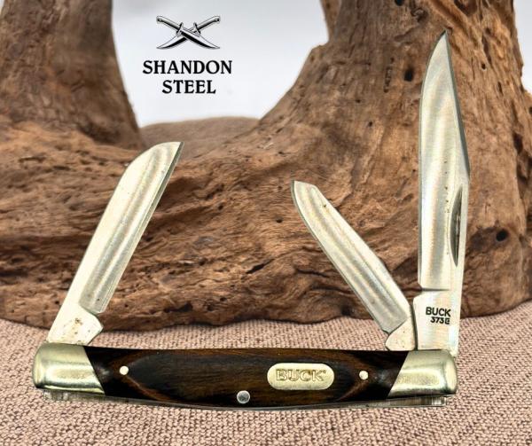 Buck Model 373 Trio 3 Blade Traditional Folding Pocket Knife w/ Wood Handle (29) Buck Model 373 Trio 3 Blade Traditional Folding Pocket Knife w/ Wood Handle (29)