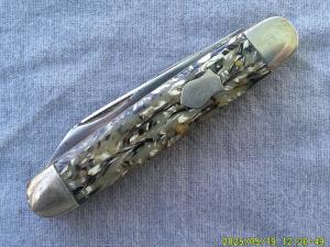 Unmarked Multi Colored Celluloid Cattle Knife