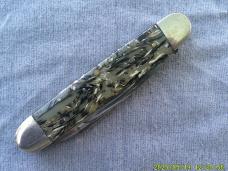 Unmarked Multi Colored Celluloid Cattle Knife