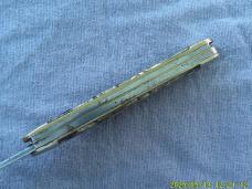 Unmarked Multi Colored Celluloid Cattle Knife