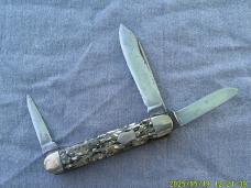 Unmarked Multi Colored Celluloid Cattle Knife