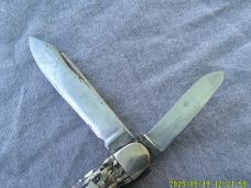 Unmarked Multi Colored Celluloid Cattle Knife