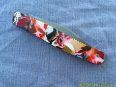 Unmarked Multi Colored Celluloid 4" Jack