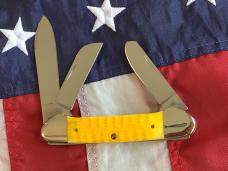 2007 Gunboat Canoe (Mdl# 6394 SS) w/ Bright Yellow Bone Handles. NOS in Orig box Minty