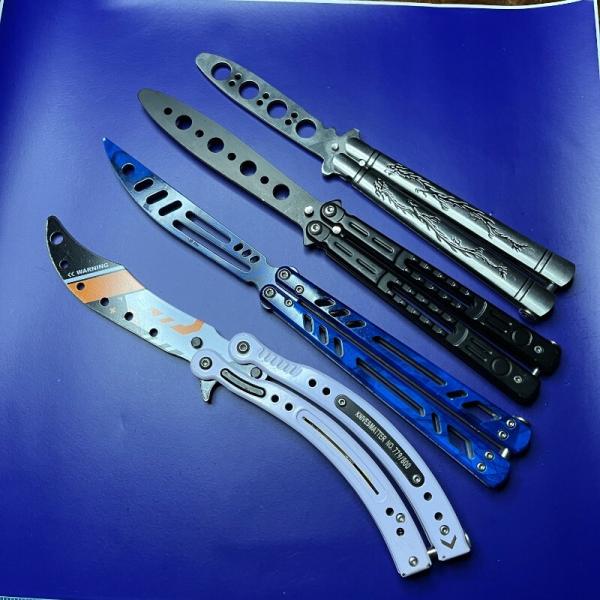 Lot of 4 Butterfly Balisong Trainer Knives Lot of 4 Butterfly Balisong Trainer Knives