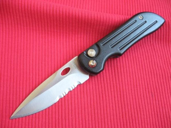 Older Partially Serrated Switchblade Knife 