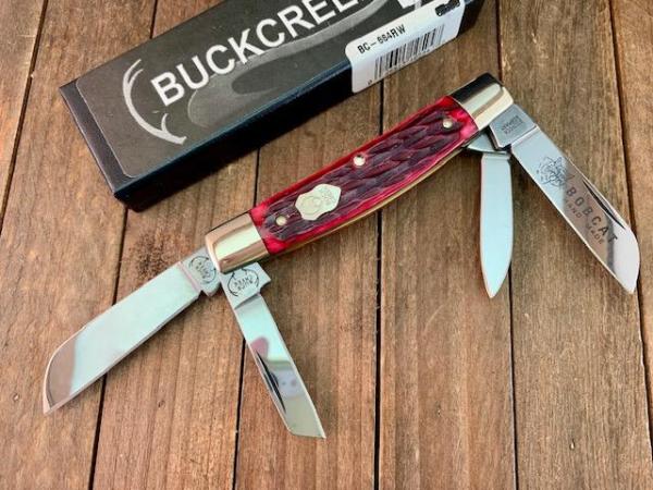 Buck Creek Bobcat Congress Made by Boker Red Pin Feather Jigged Bone Solingen Germany