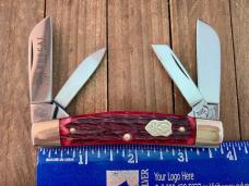 Buck Creek Bobcat Congress Made by Boker Red Pin Feather Jigged Bone Solingen Germany