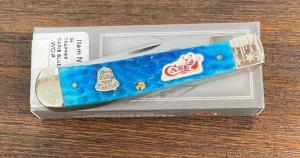 Case 2015 Caribbean Blue jig BN Christmas Trapper with scrolled bolsters