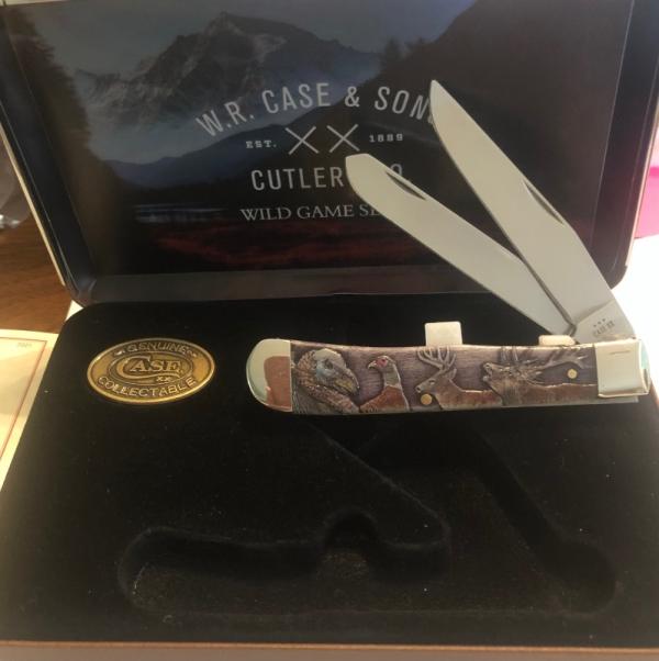 New In Display Case Wild Game Trapper and Medallion