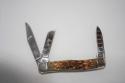 Case Carbon Series Amber Bone Peach Seed. Stockman 63032