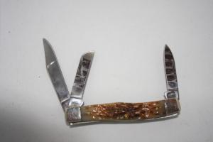 Case Carbon Series Amber Bone Peach Seed Stockman 63032