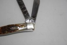 Case Carbon Series Amber Bone Peach Seed. Stockman 63032