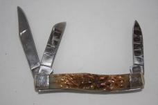 Case Carbon Series Amber Bone Peach Seed. Stockman 63032