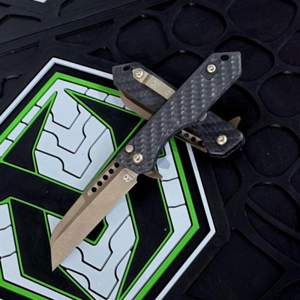 Heretic Knives USA JINN MANUAL FOLDER BRONZE W/CARBON FIBER CHASSIS H213-7A-CF Heretic Knives USA JINN MANUAL FOLDER BRONZE W/CARBON FIBER CHASSIS H213-7A-CF