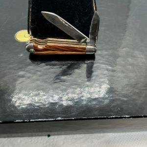 Antique imperial or hammer brand tiny 2 blade Jack knife with a tigers eys design handles 