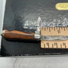 Antique imperial or hammer brand tiny 2 blade Jack knife with a tigers eys design handles 