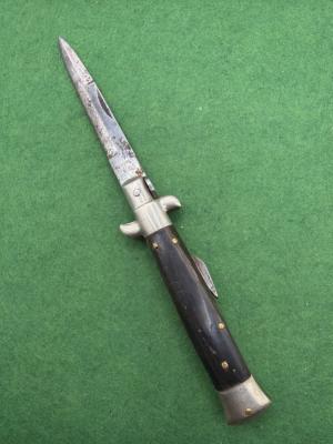 7 Hoffritz NY Stamped Manual Humpback Stiletto