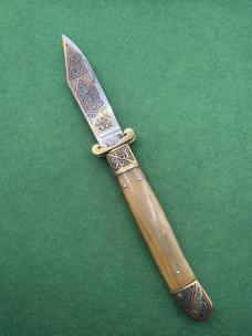 Decorated in Horn Toledo Shell Puller