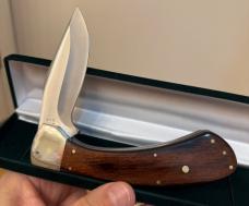1991 Case XX Sidewinder w/ beautiful Pakkawood handles. Absolutely gorgeous knife in mint condition!