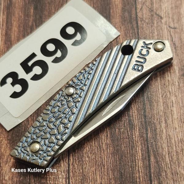 Buck Knives 565 Tiny Titanium 2.5" Closed Folding Pocket Knife Made In USA 1989