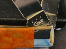 2015 Case Orange Coral Trapper with MOP inlay on handles EX254 SS