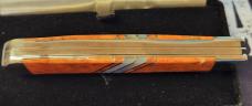 2015 Case Orange Coral Trapper with MOP inlay on handles EX254 SS
