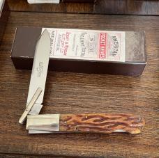 Schatt & Morgan Swing guard lockback honey brown wormed groove